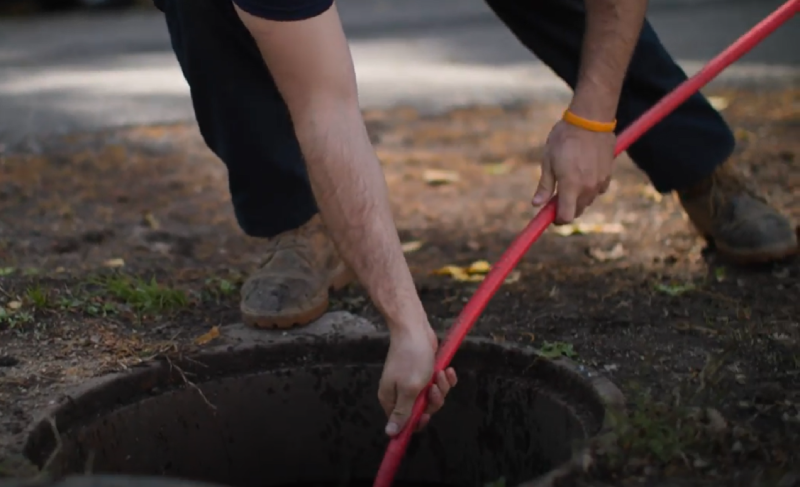 hydro jetting a sewer manhole