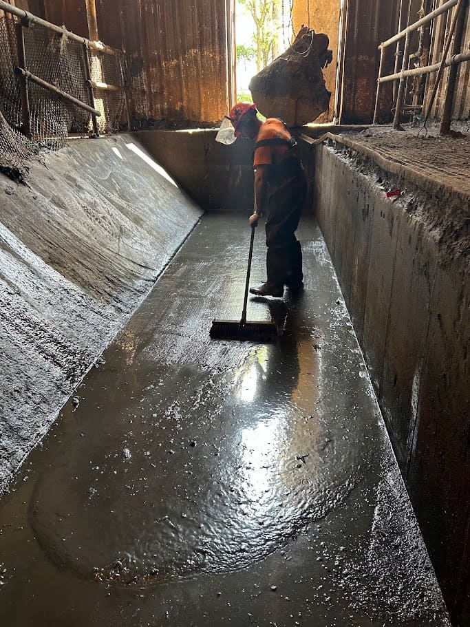 cleaning a waste pit