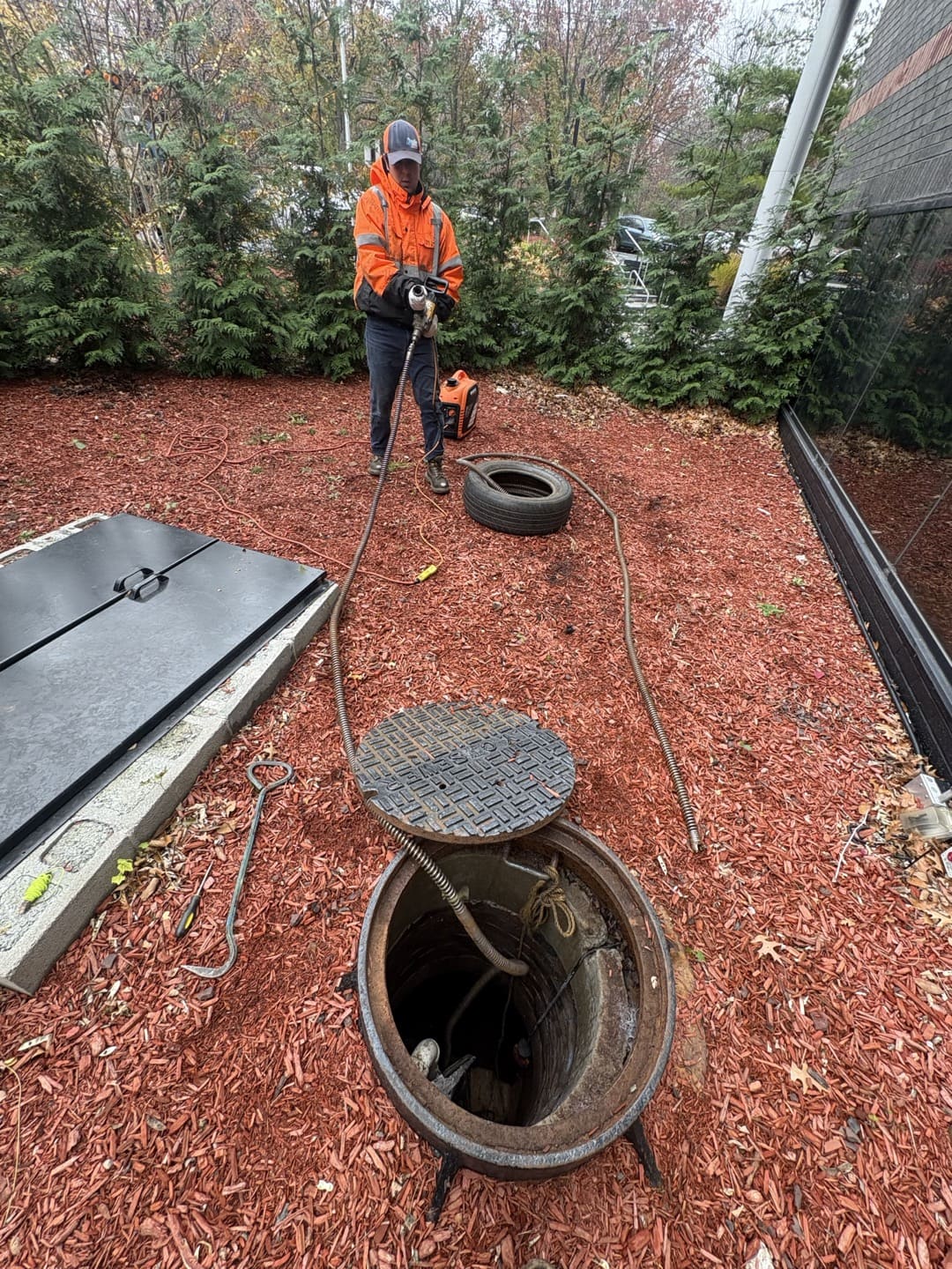 mechanical snaking of sewer manhole